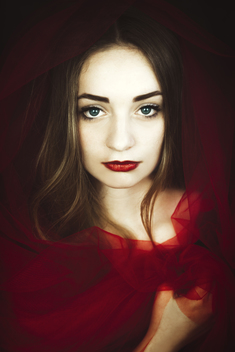 young beautiful girl in red tulle, looking you, sentimental, painterly