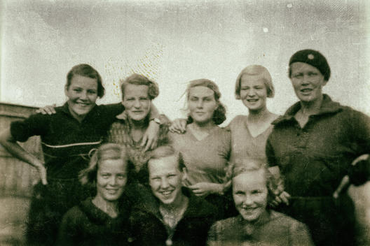 Old Photograph of Group of Happy Young Female Friends in Northern Europe Posing Outdoors