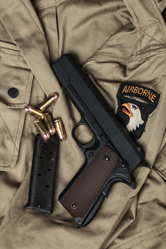 1911a1 on a 101st Airbourne Field Jacket 3