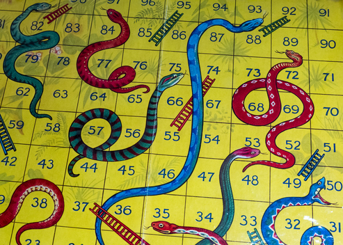 Vintage 'Snakes & Ladders' Game Board